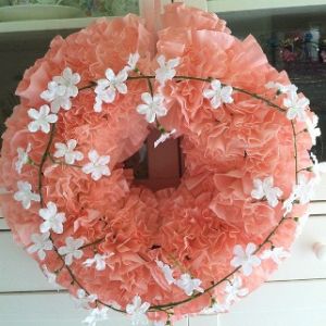 My favorite craft project was a coffee filter wreath.  Simply take coffee filters and a foam wreath, which you can find in any craft store.  I bunched the filters and glued them to the wreath; spray-painted the filters; and added a touch of artificial flowers. 