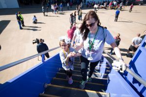 Southwest Airlines sends a plane full of chronically ill children and their families to Disney World during the annual Kidds Kids event. // Stephen M. Keller