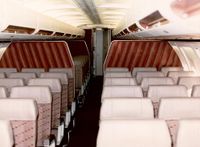 The 300 Midcabin Lounges on the wings, looking aft. Both the 200's and 300's had these. "When Southwest introduced the 737-700 in January 1998, new federal safety regulations doomed the lounge areas.  No rear-facing seats could meet this new safety requirement, and the -700s were delivered with all forward facing seating.  Lounges in the -300s and -500s were phased out, and only the -200 retained lounges until they were retired at the start of 2005."