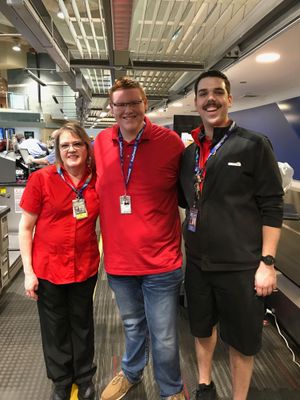 Cheryl, Myself, and Zach behind the SWA ticket counter at MCI