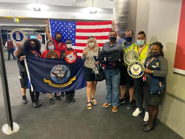 Suzi Way pictured with Baltimore Station Employees
