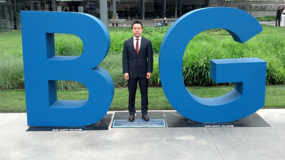 Lin stands in the “BIG” letters that can be found throughout Dallas.