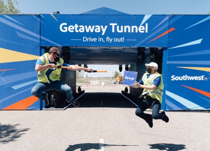 Southwest Airlines Employees Volunteering in front of Southwest Getaway Tunnel