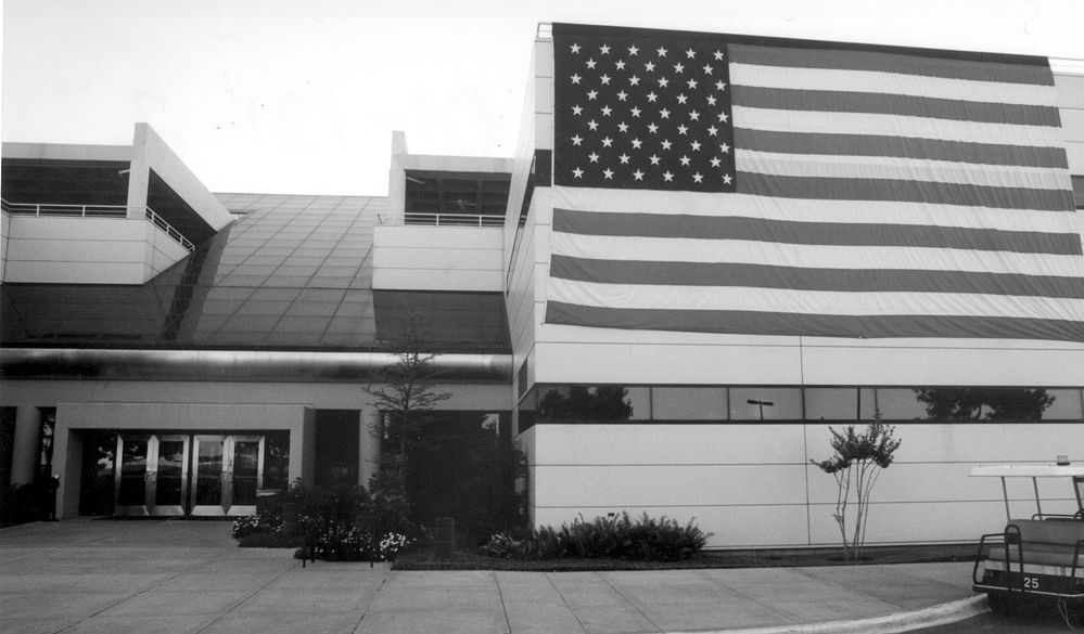 An American flag is prominently displayed at Southwest Headquarters in Dallas after the 9/11 attacks in 2001, an emblem of hope amidst the nation’s grief.