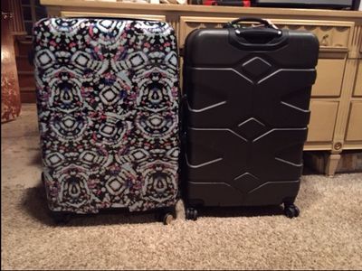 Suitcase in question is on the left.