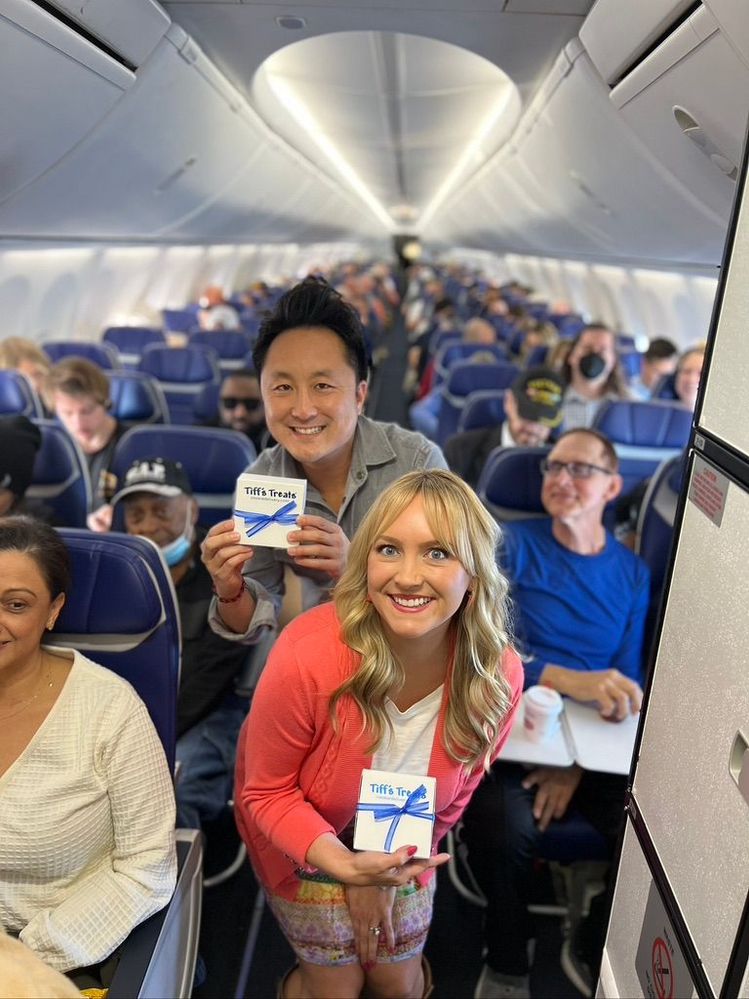 Tiff's Treats Founders Tiff & Leon Chen Delivering Cookies Onboard a Southwest Flight.jpeg