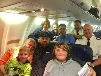 Logan, his family, and the Crew of Flight #3024, TUL - HOU.