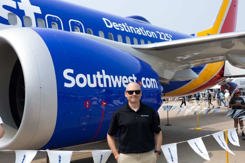 Richard standing in from of the commemorative Southwest aircraft.jpg