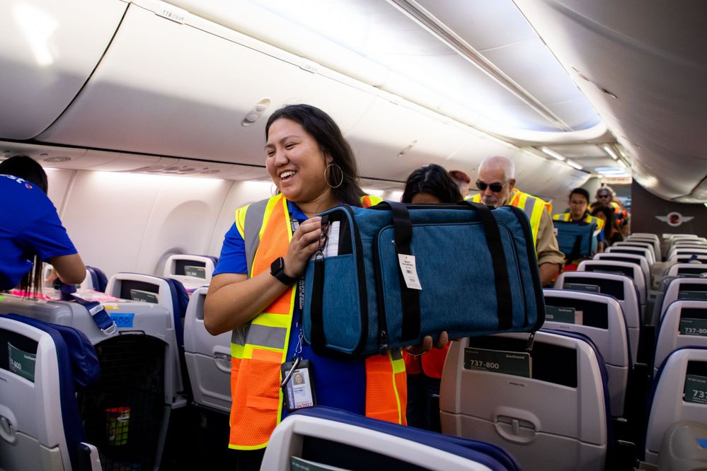 Southwest Airlines Employees and Crew members helped transport 136 shelter cats and dogs .JPG