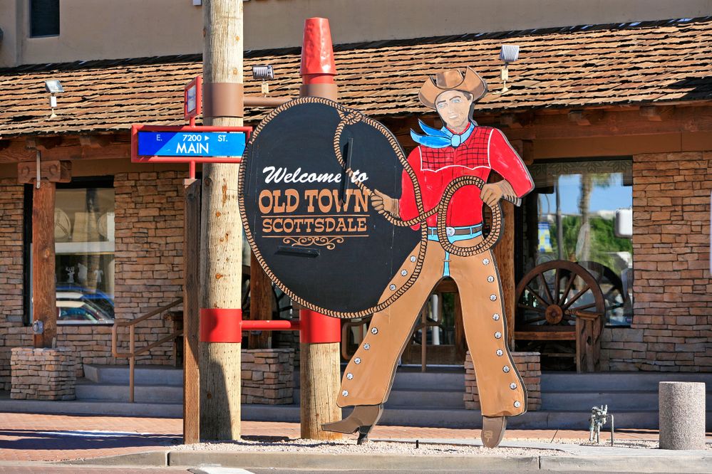 Old Town Scottsdale cowboy sign in historic shopping district Scottsdale Arizona