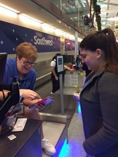 Tiffanie checking in at the Southwest counter