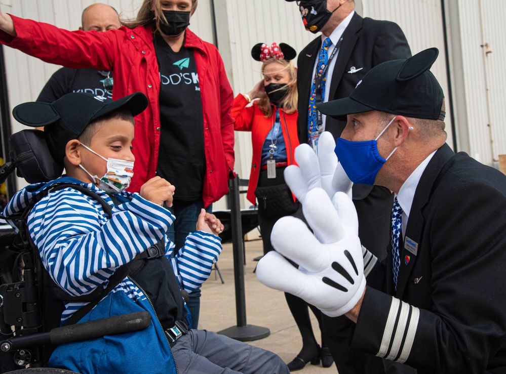 Southwest Pilot, Keltner, welcomes his nephew, Gabriel, aboard the 2021 Kidd's Kids flight.