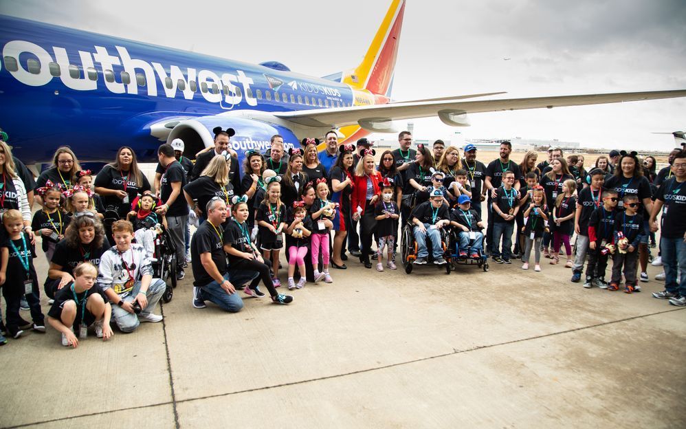 Kidd’s Kids and their families gather before boarding the Southwest Airlines charter flight to Orlando.